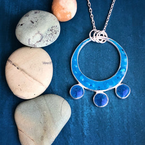 Silver In Balance Necklace, Bigger Circle with three smaller circles on bottom inlayed with blue turquoise and lapis lazuli handmade empowering jewelry vermont