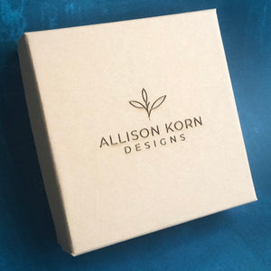 Brown Box with Allison Korn Designs Logo- plant with 3 leaves. Handcrafted Silver Jewelry Vermont. 